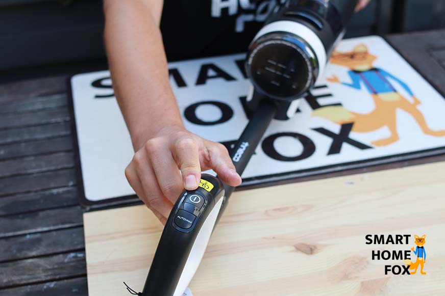 Sélectionnez le mode d'aspiration avec le bouton sur la poignée