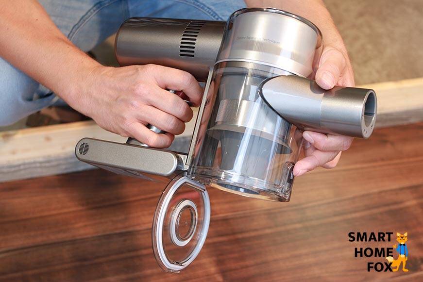 fonction de vidage bac à poussière Dyson v11